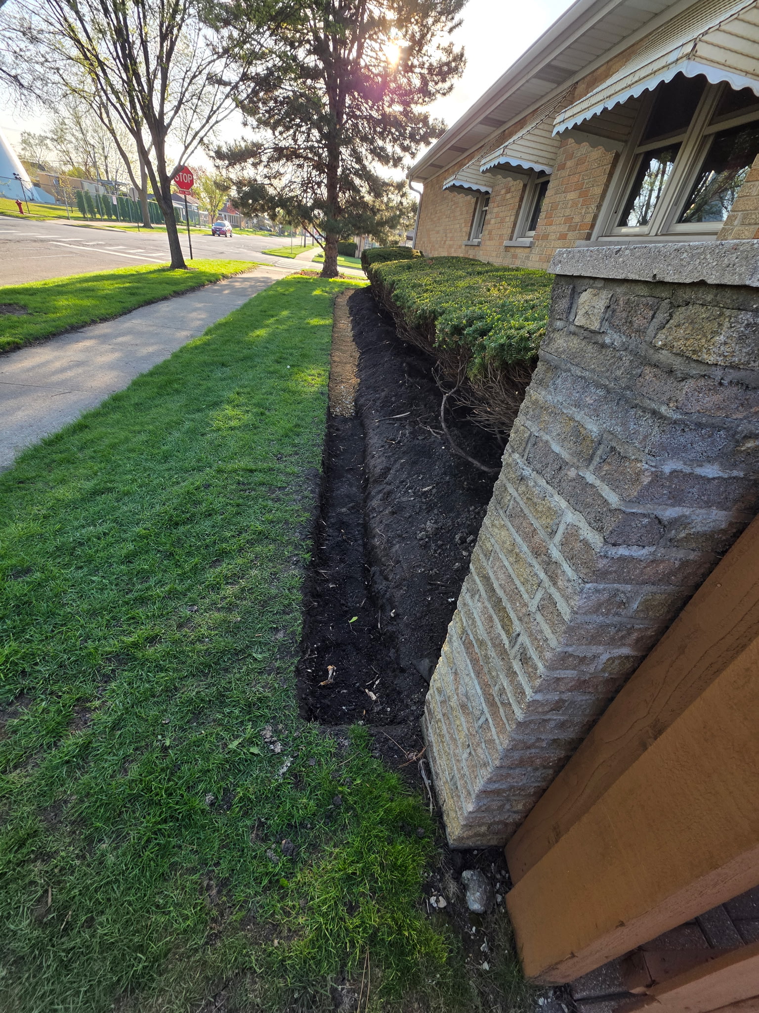 French drain trench cut along the foundation